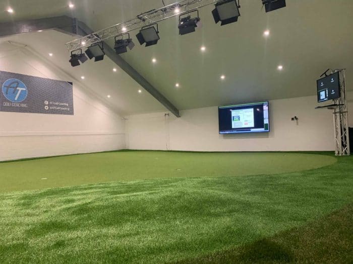 Indoor golf practice at Gloucester Golf.